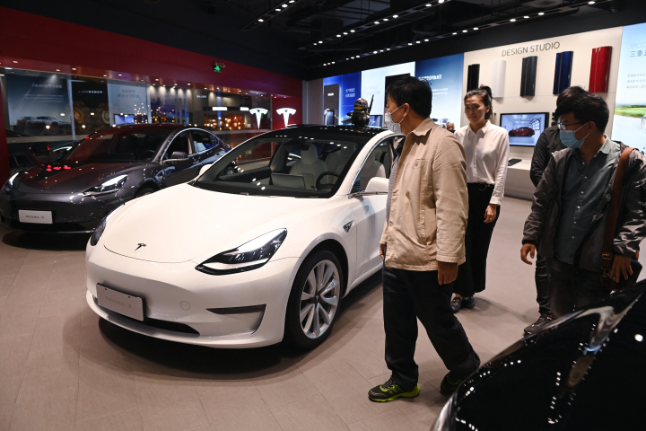 Le Tesla Model 3 à Pékin, Chine - GREG BAKER / AFP