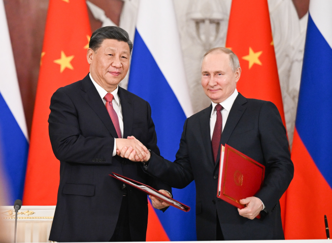 Vladimir Poutine et XI Jinping (Xie Huanchi/XINHUA-REA)