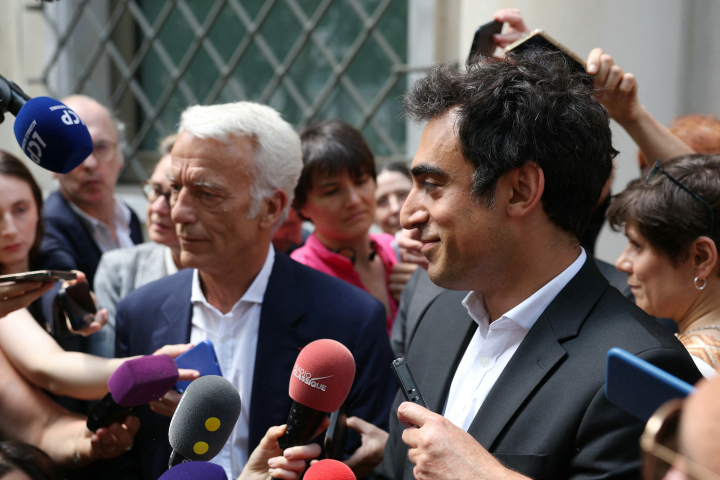 Patrick Martin et Amir Reza-Tofighi (Photo by Alain JOCARD / AFP)
