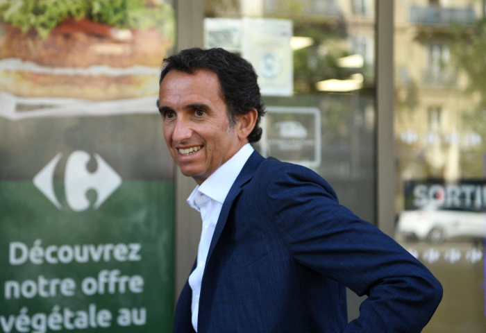 Alexandre Bompard (Photo by Eric PIERMONT / AFP)