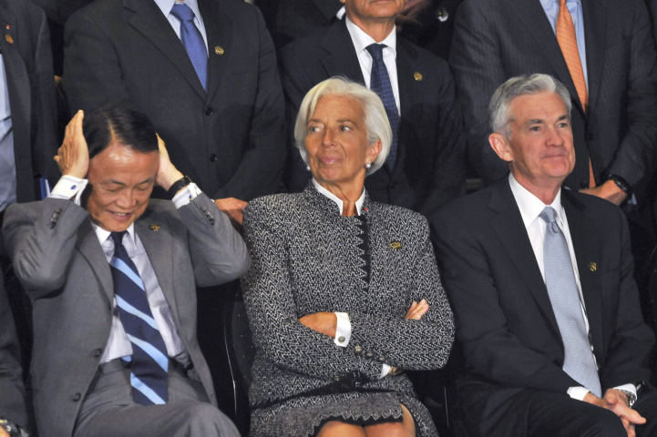 Christine Lagarde, présidente de la BCE, à gauche, et Jerome Powell, président de la Fed, à droite (Patricio Murphy/ZUMA/REA)