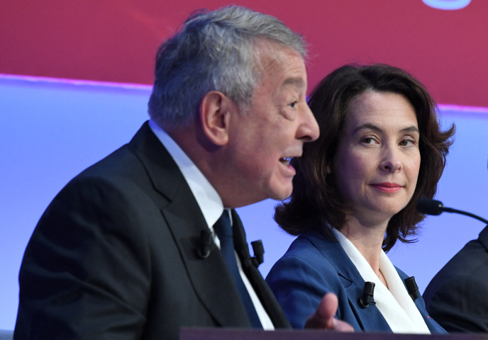 Antoine Frerot et Estelle Brachlianoff (Photo by Eric PIERMONT / AFP)