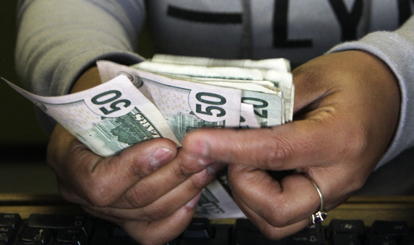 Liasse de billets. HERIKA MARTINEZ / AFP