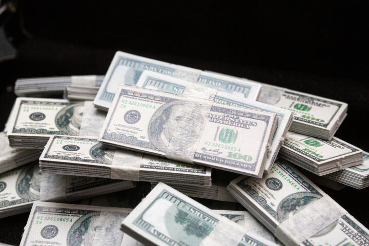 Dollars. Photo by Romain Costaseca / Hans Lucas / Hans Lucas via AFP