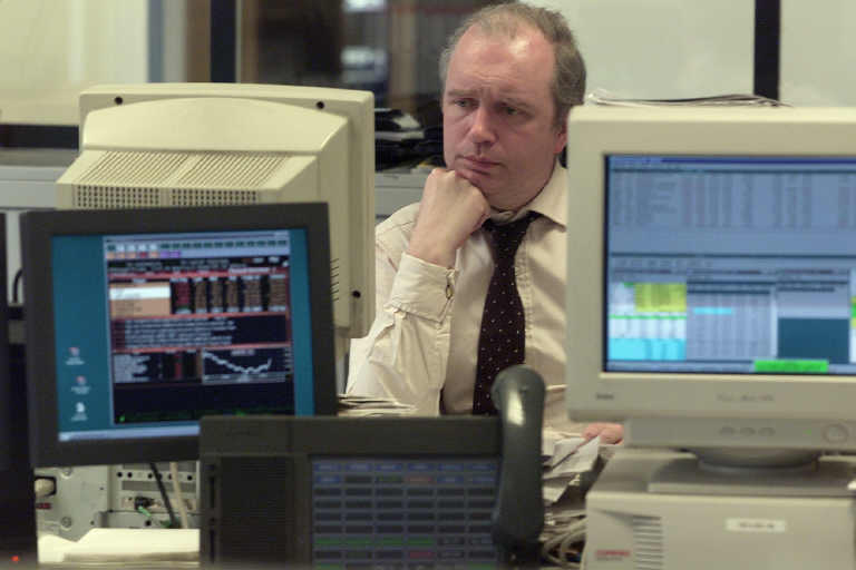 Trader en salle des marchés