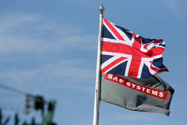 The British Union Jack flag flies alongside the BAE flag - AFP PHOTO / LINDSEY PARNABY (Photo by LINDSEY PARNABY / AFP)