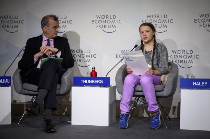 François Villeroy de Galhau, gouverneur de la Banque de France, et Greta Thunberg, activiste pour le climat - Fabrice COFFRINI / AFP